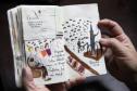 Fã da Orquestra Sinfônica do Paraná e de Beatles, artista ilustra concertos há uma década