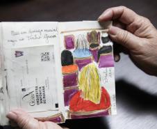 Fã da Orquestra Sinfônica do Paraná e de Beatles, artista ilustra concertos há uma década